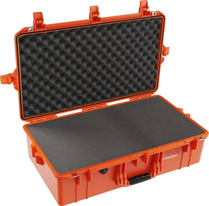 The 1605 Air Case is an open, orange, lightweight hard plastic travel case with egg crate foam in the lid and flat foam in the base, ideal for secure storage on the go.