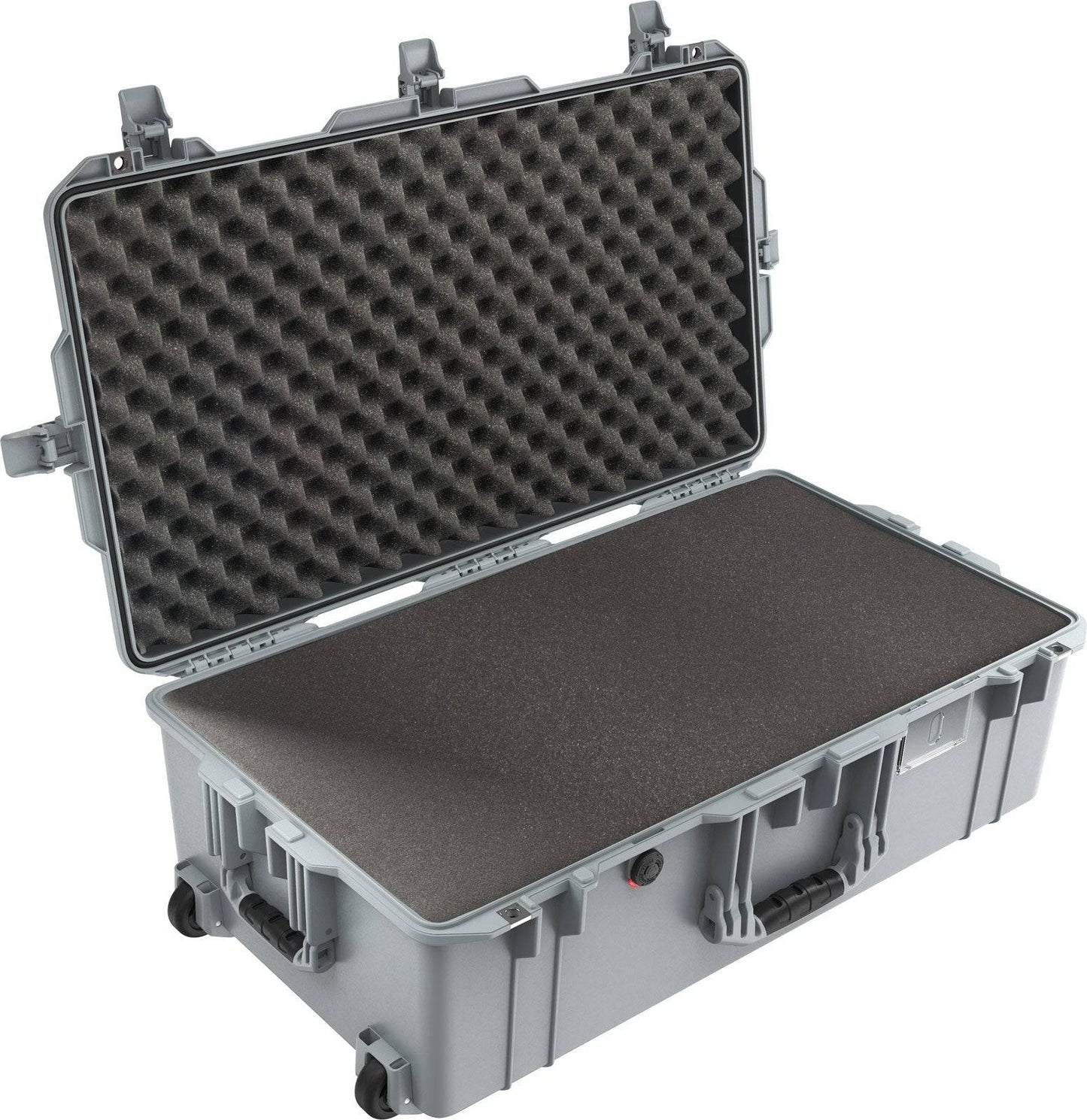 The 1615 Air Case is a large, hard-shell case with foam padding, shown open with egg-crate foam in the lid and flat foam in the base; includes transport handles and wheels.