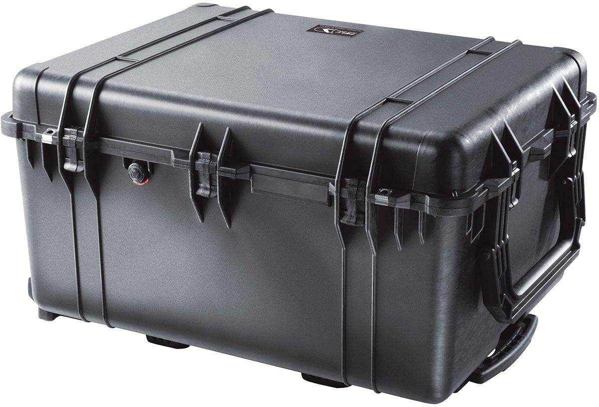 The 1630 Protector Transport Case is a large, hard-shell black case with reinforced corners, secure latches, and a side handle on a white background—engineered to be watertight and crushproof for superior protection.