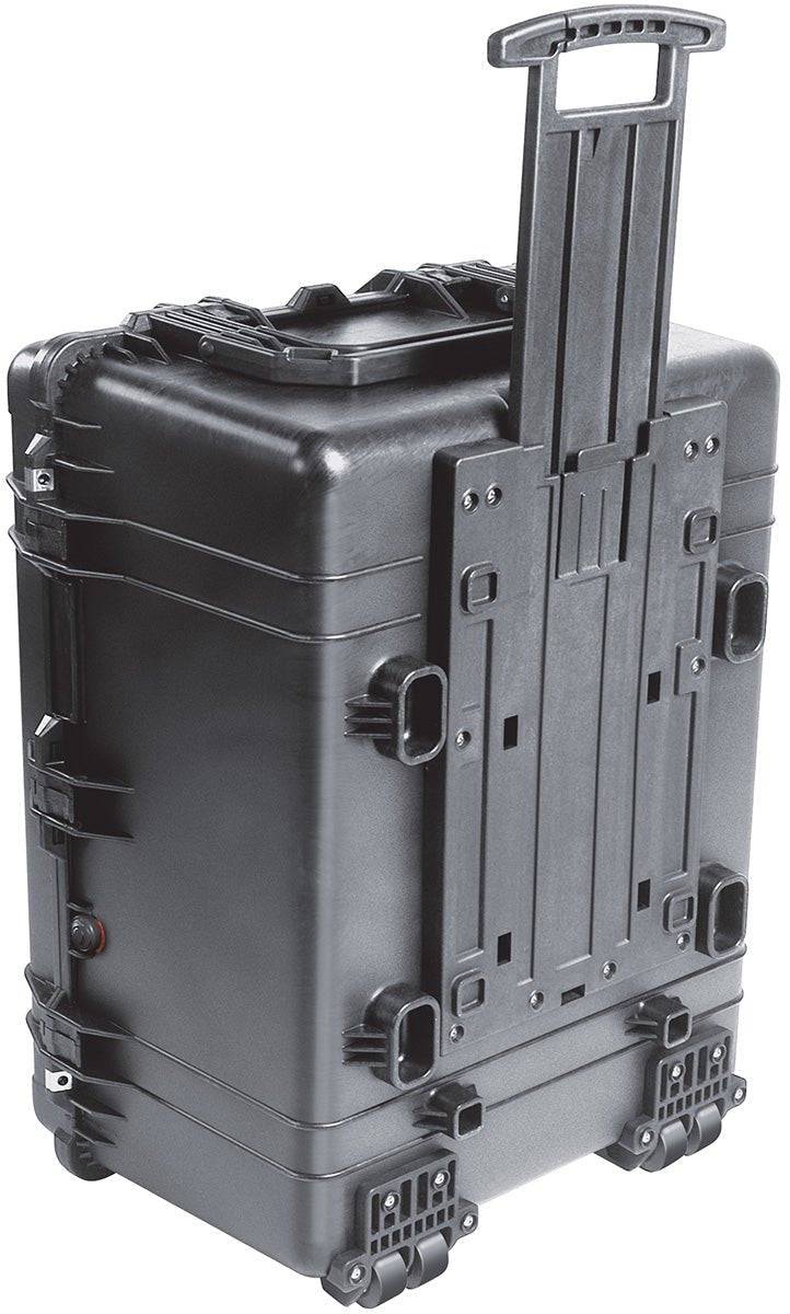 The 1630 Protector Transport Case is a black, hard-shell wheeled case with an extended retractable handle, designed to be crushproof and watertight for heavy-duty transport and equipment protection.