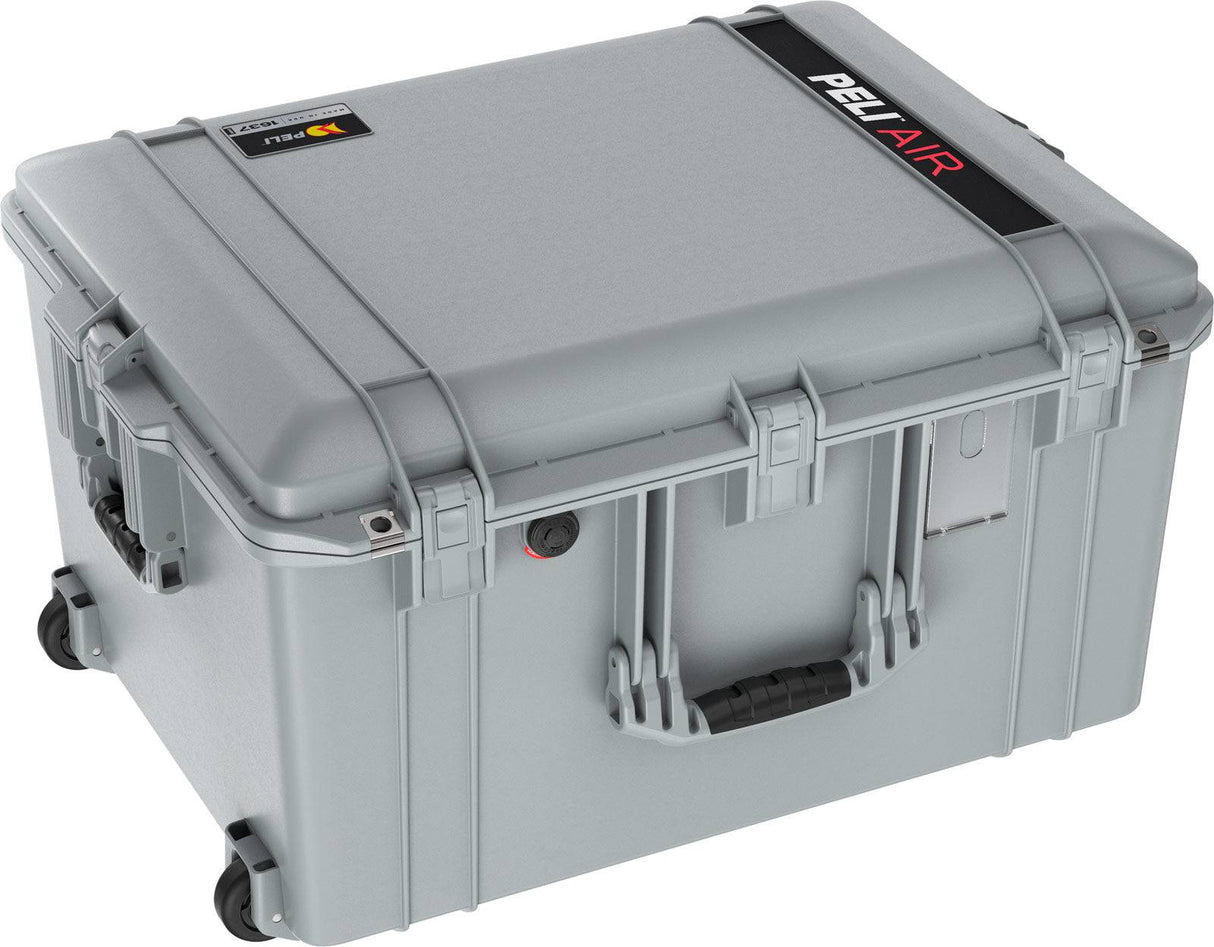 A gray, hard-shell 1637 Air Case made from lightweight polymer features a handle, secure latches, waterproof protection, and has "Pelican AIR" labeled on the lid.
