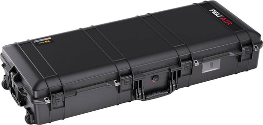 The 1745 Air Case is a black, lightweight polymer case with wheels and handle, rectangular in shape, closed and secured for transport or storage; it’s durable, waterproof, and designed for ultimate protection.