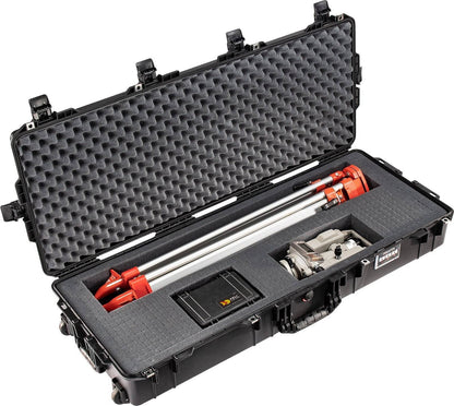 A 1745 Air Case with custom foam protects red and silver industrial equipment, a controller, and accessories, offering durable waterproof storage for all contents.