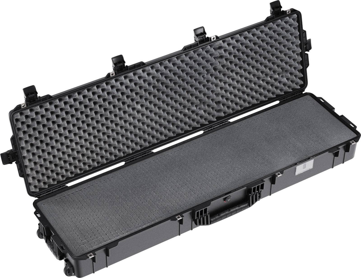 The PELI 1755 Air Case, shown open and empty with foam padding, is a long black lightweight protective case designed to safeguard your gear—ideal as a waterproof equipment case for storage and travel.