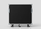 The 18U Double Bay Rack Case is a large black rectangular equipment case with metal edges, side handles, and four caster wheels, displayed against a plain light gray background.