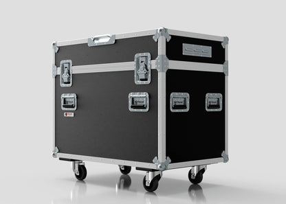 The 2 Way Ayrton Rivale Case is a large, black flight case with metal edges, handles, and latches, mounted on four caster wheels, measuring 1014 x 608 x 912 mm, and displayed against a plain light background.