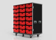 The 21 Way Poly Tray Case is a large mobile medical storage unit with 21 red drawers, black side panels, metal edges and handles, set on four caster wheels and shown against a plain background.