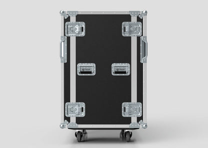 A 24U Double Bay Rack Case in black and silver, featuring metal edges, four latches, two side handles, and wheels, is shown standing upright against a plain background.