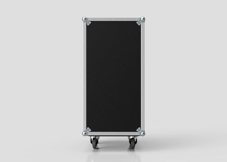 The 26U Standard Rack Case, a black rectangular case with metal edges and corner protectors, stands upright on four caster wheels against a plain light background.