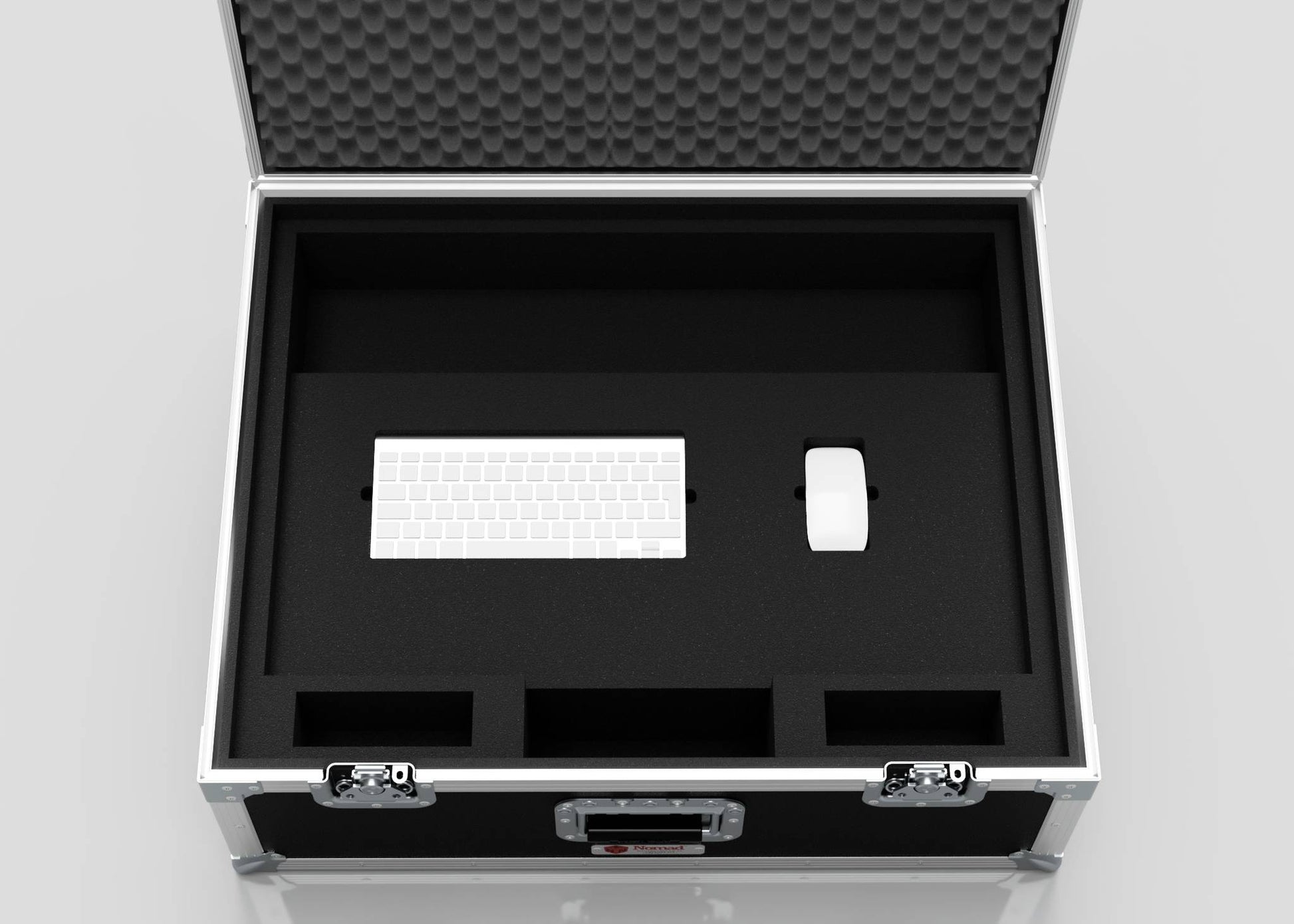 The 27" iMac Case is an open black protective case with foam inserts that holds a white computer keyboard and mouse, plus extra empty compartments. Its external dimensions are 745 x 600 x 273 mm.