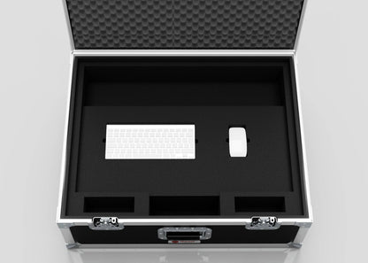 The 27" iMac Case is an open black protective case with foam inserts that holds a white computer keyboard and mouse, plus extra empty compartments. Its external dimensions are 745 x 600 x 273 mm.