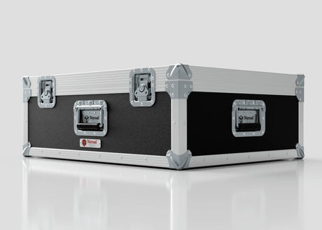 The 27" iMac Case, finished in black and silver with reinforced corners and metal latches, sits closed on a white reflective surface. Its external dimensions are 745 x 600 x 273 mm.