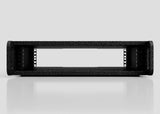 Front view of the 2U Standard Rack Sleeve, an empty black metal rackmount case with a textured finish and open center, shown on a reflective white surface. External dimensions: 514 x 545 x 123 mm.