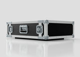 The 2U Suspended Shock Mounted Rack Case, a large rectangular black and silver case with metal-reinforced corners and latches, sits on a reflective white surface and provides superior protection with its shock mounted rack.