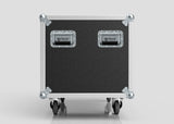 The 3 Way COLORado PXL Curve 12 Case is a black and silver rolling equipment case with metal edges, two Nomad-labeled handles, four wheels, and external dimensions of 1220 x 600 x 661 mm, shown against a plain light background.