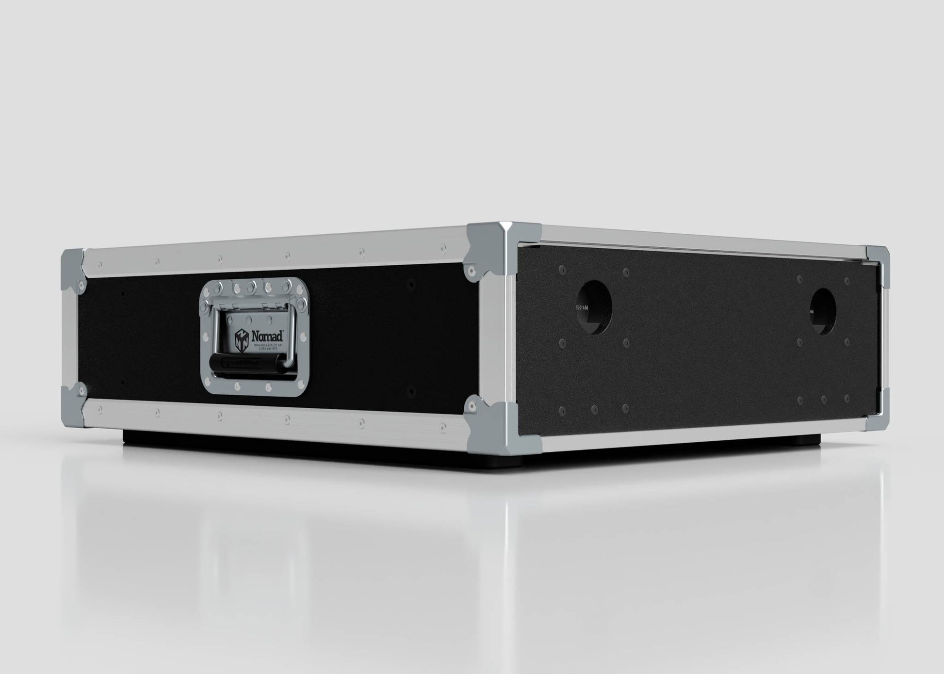 A 3U Slam Rack Case, a rectangular black and silver hard case with metal reinforcements, front handle, and side circular cutouts (external dimensions: 643 x 561 x 204 mm), is placed on a white surface.