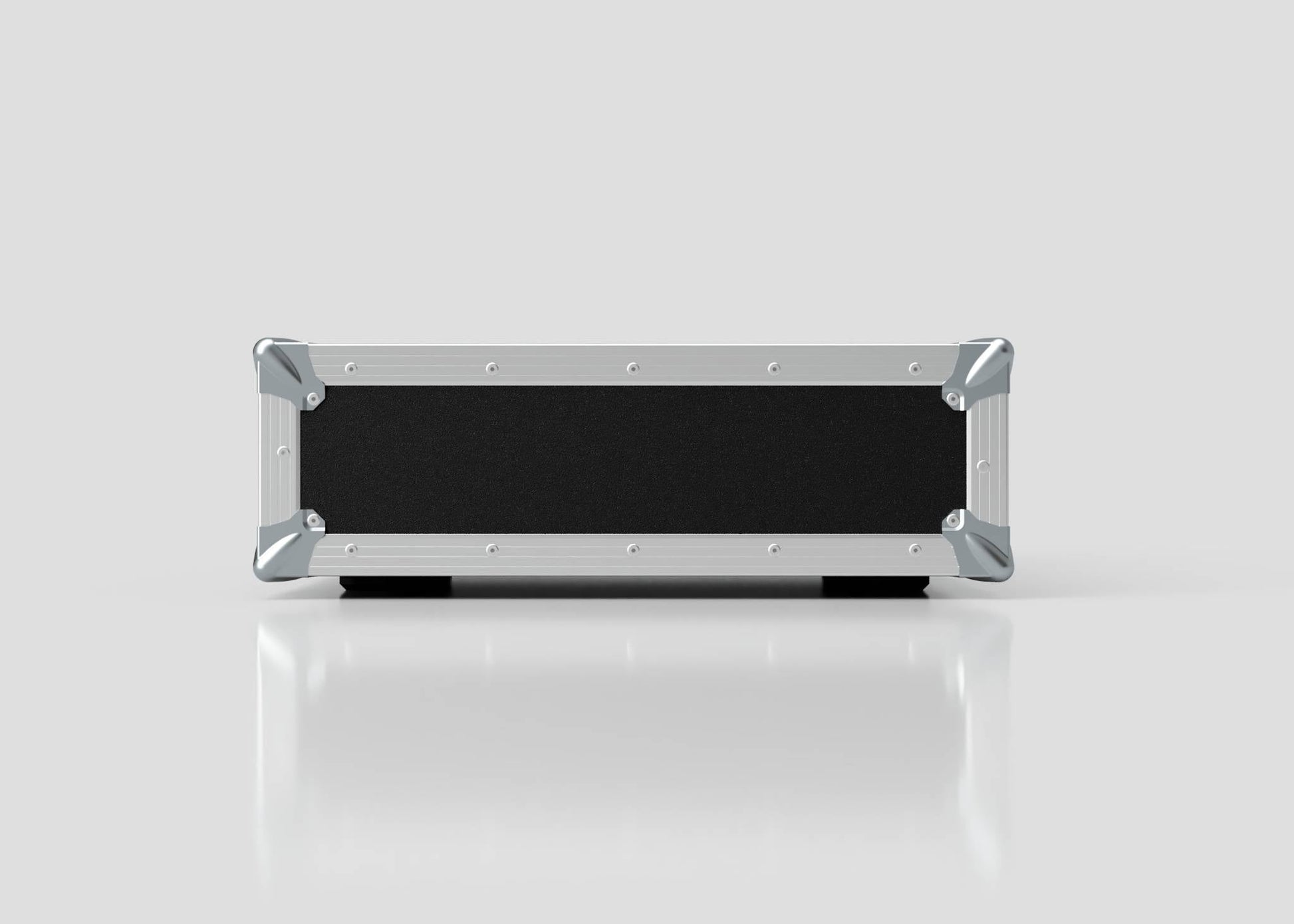 The 3U Standard Rack Case, rectangular in shape with a black and silver finish, sits on a reflective white surface against a plain light gray background, viewed from the front to showcase reliable equipment protection.