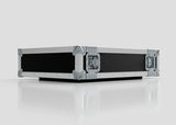 The 3U Standard Rack Case, a black rectangular case with metal-reinforced corners and latches for equipment protection, is displayed on a reflective white surface with a plain light gray background.
