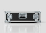 A 4U Standard Rack Case, black and silver with metal reinforcements and latches, labeled Nomad, is displayed on a white reflective surface.