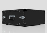 A 5U Lite Guard™ Standard Rack Case—a black, rectangular, lightweight HDPE 19-inch flight case with silver corners, rivets, handle, and latches—rests on a reflective surface against a plain light background.