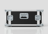 A 5U Standard Rack Case in black and silver with metal reinforcements and latches, featuring a Nomad label on the front, is placed on a white reflective surface.