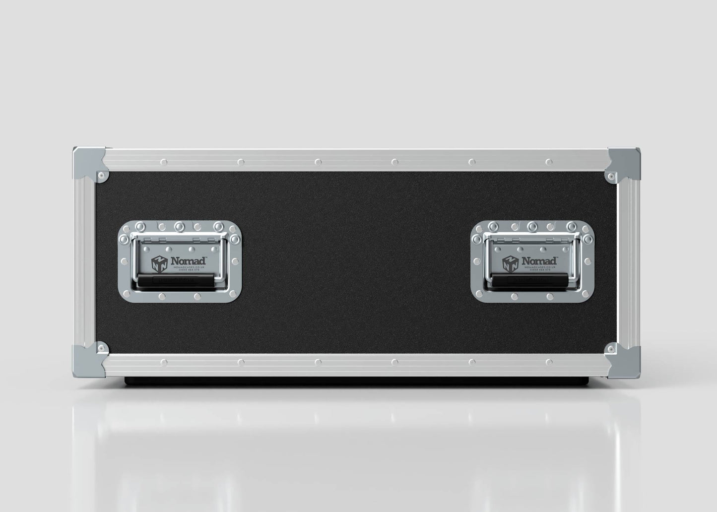 A rectangular black 6U Shock Mount Slam Rack Case with silver metal edges and two metal handles labeled “Nomad,” stands upright on a white surface against a plain background.