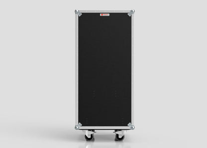 The Nomad Cases 7 Drawer Production Case is a black rectangular equipment case with metal edges, corner protectors, and side hardware, standing upright on four caster wheels. Compact and practical, it is shown against a plain light gray background.