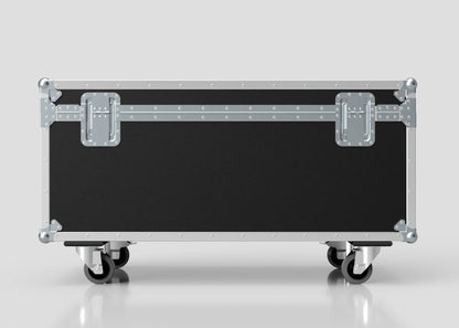 The 8 Way Martin Mac One Case is a large black and silver metal equipment case with wheels, closed and viewed from the front on a smooth reflective surface; its external dimensions are 1231 x 600 x 674 mm.