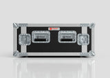 The Nomad 8U Foam Shock Mounted 19" Rack Case is a black and silver hard shell equipment case with metal reinforcements, three handles, rack strips, and is shown on a reflective surface.