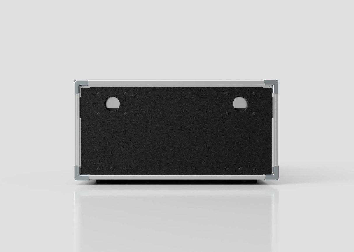 A rear view of the 9U Shock Mount Slam Rack Case shows a rectangular black panel with two circular cable openings.