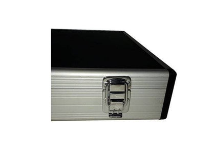 Close-up of a metal latch on the corner of the Aluminium Print Portfolio, a rectangular case finished in silver and black.