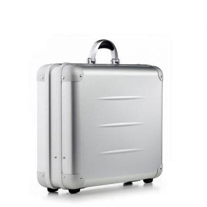 The ALUpur 98300, a silver anodised aluminium case with a curved handle and sturdy metal hinges, stands upright on a white background.