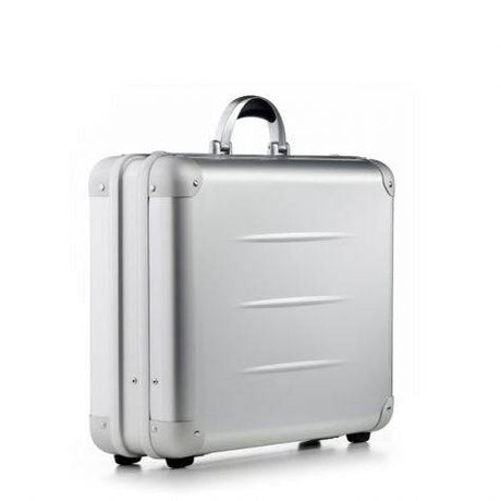 The ALUpur 98300, a silver anodised aluminium case with a curved handle and sturdy metal hinges, stands upright on a white background.