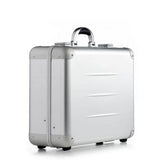 The ALUpur 98400, a silver anodised aluminium case with rounded corners, a metal handle, and a hard shell, is shown on a white background.