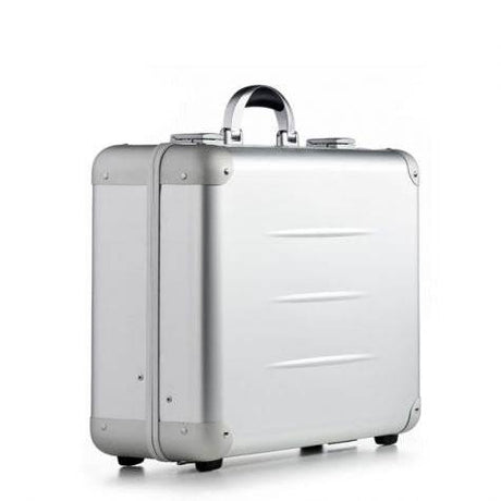 The ALUpur 98400, a silver anodised aluminium case with rounded corners, a metal handle, and a hard shell, is shown on a white background.