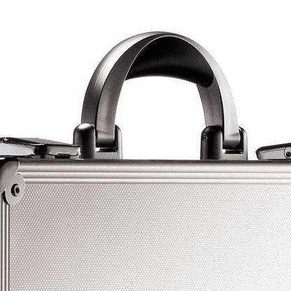 A close-up of the ARK 90600 shows its silver hard shell, black handle, top corner, aluminium frame case design, and part of the secure latch.