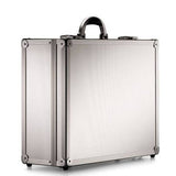 The ARK 90700 is a silver, robust aluminium frame case with reinforced metal corners, a rounded handle, and custom CNC foam fittings, seen standing upright on a white background.