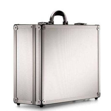 The ARK 90700 is a silver, robust aluminium frame case with reinforced metal corners, a rounded handle, and custom CNC foam fittings, seen standing upright on a white background.