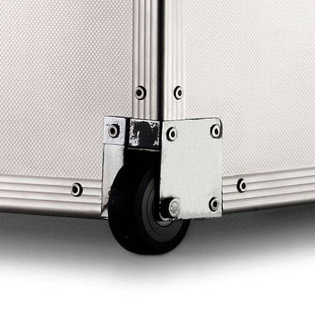 Close-up of the ARK 90900 case corner shows a black caster wheel, silver hardware, and textured white paneling—built with a durable aluminum frame and custom CNC foam for superior protection.