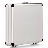 The AZKE 95260 is a closed silver aluminium frame case with black corner protectors, shown upright on a white background, and features custom CNC foam fittings for secure storage.
