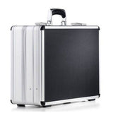The AZKE 95600 is a silver and black aluminium frame case with a handle, shown closed and standing upright on a white background, providing both durability and style.