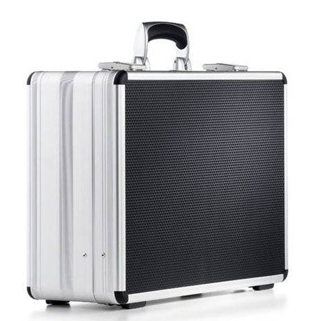 The AZKE 95600 is a silver and black aluminium frame case with a handle, shown on a white background, and features custom CNC foam fittings for secure storage.
