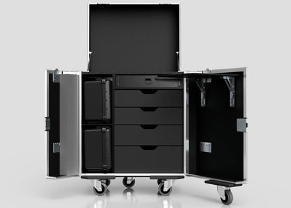 The Backline Workbox Case with 4 drawers plus a 2U rack drawer is a large storage case on wheels (800 x 600 x 1090 mm) with two side doors, an open top, and interior drawers, shelves, and black equipment cases.