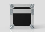A Camera Lens Case in square black and silver metal with reinforced corners, shown closed and upright against a plain light background.