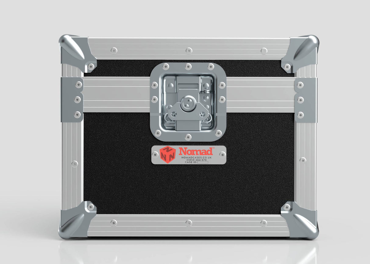 Black and silver Camera Lens Case with reinforced metal corners, a central latch, and a red Nomad label on the front.