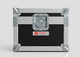 Black and silver Camera Lens Case with reinforced metal corners, a central latch, and a red Nomad label on the front.