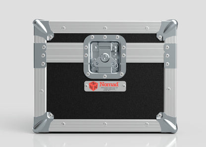 Black and silver Camera Lens Case with reinforced metal corners, a central latch, and a red Nomad label on the front.