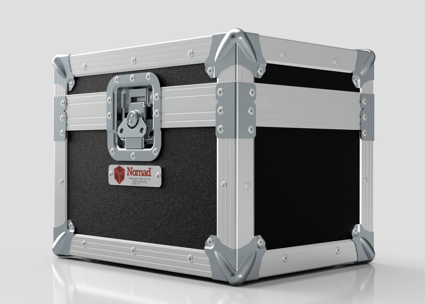 A durable black and silver Camera Lens Case with reinforced corners, a front latch, and a Nomad label on the side.