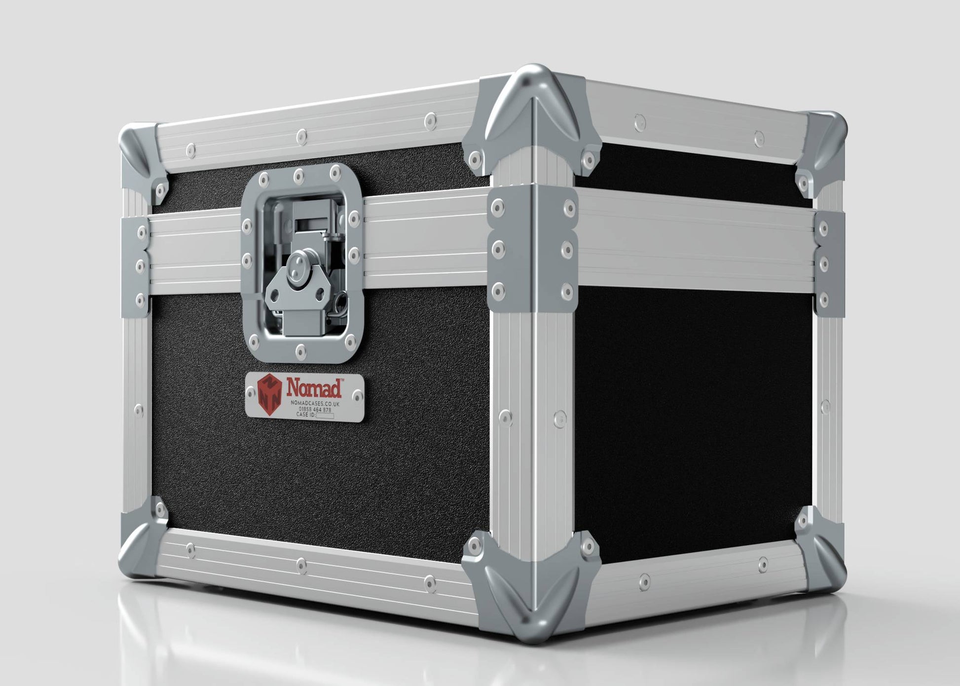 A durable black and silver Camera Lens Case with reinforced corners, a front latch, and a Nomad label on the side.