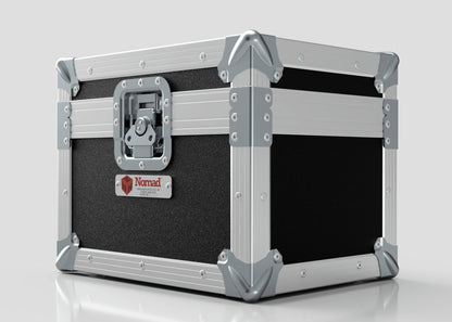 A durable black and silver Camera Lens Case with reinforced corners, a front latch, and a Nomad label on the side.